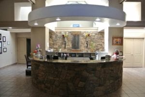 At the reception area of Caughlin Crossing Dentistry